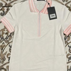 Gfore brand new golf shirt with zipper front.